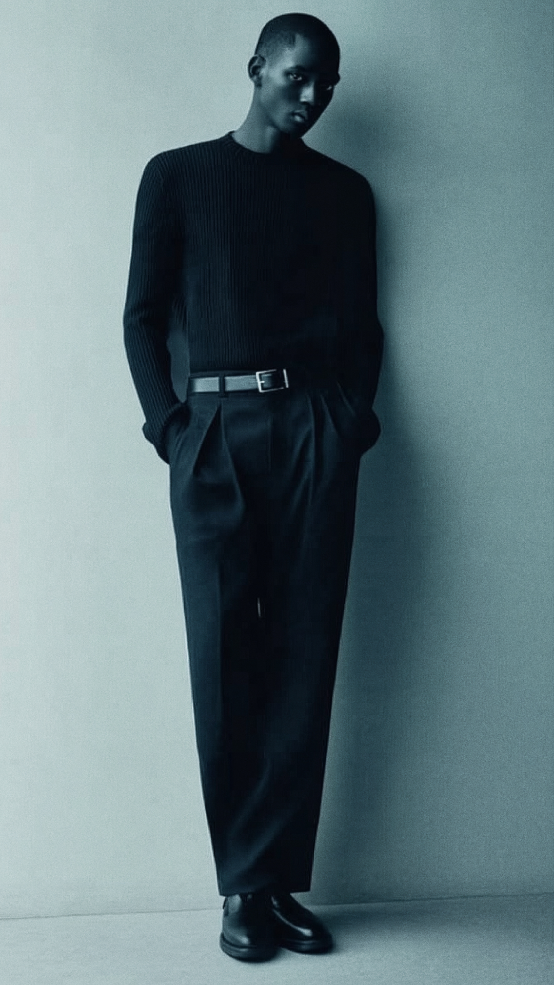 Man in black outfit