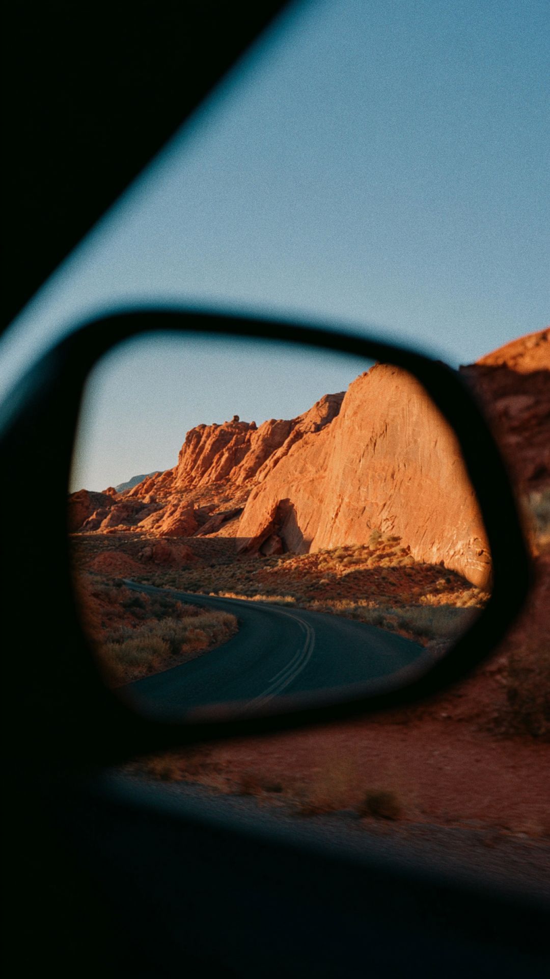 Landscape in car mirror